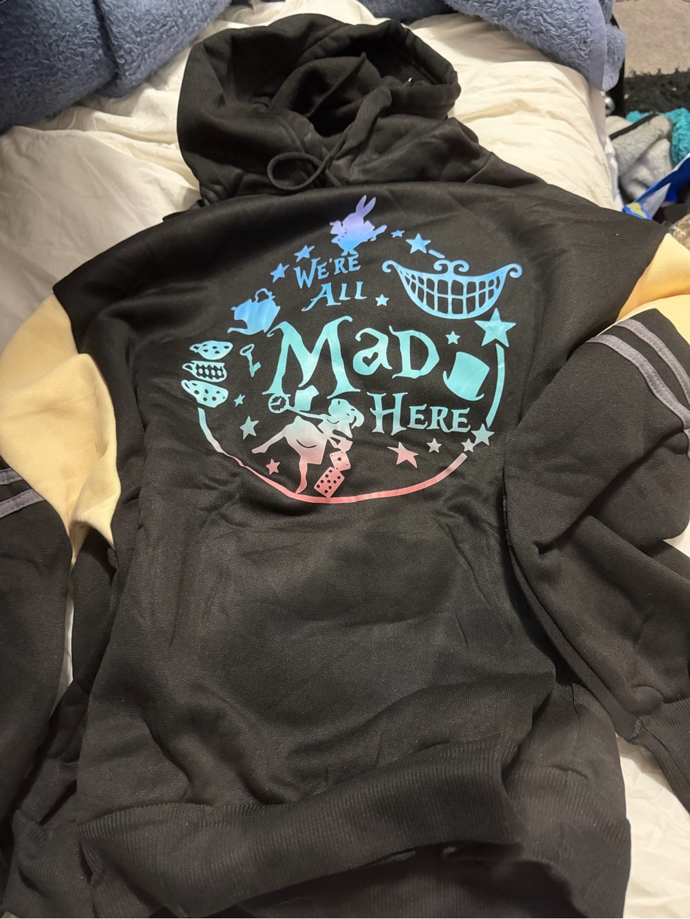 Black 'We're All Mad Here' Graphic Hoodie with Pastel Ombré Print